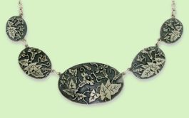 Als 5 teiliges Collier oval in Sterlingsilber Als 5 teiliges Collier oval in Sterlingsilber